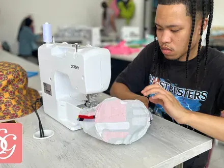 Sew & Grow student &mdash; heads down, getting it right