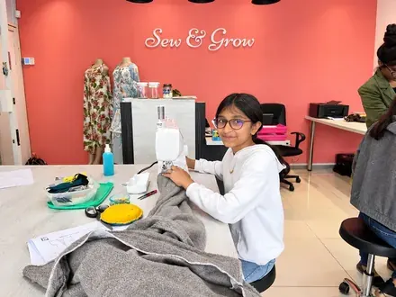 Sew & Grow student &mdash; busy hands, happy faces
