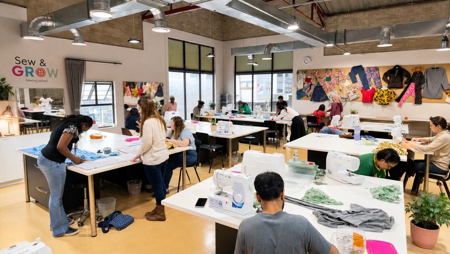 A busy session in the Sew and Grow studio with students at their machines